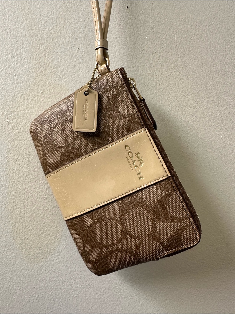COACH Brown and Cream Signature Wristlet with Leather Accent